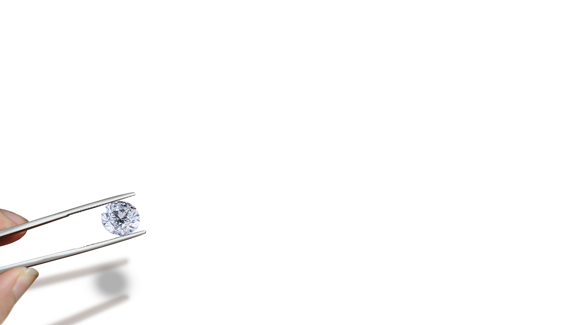 Internally flawless D-color Diamond, held by certified gemologist using tweezers